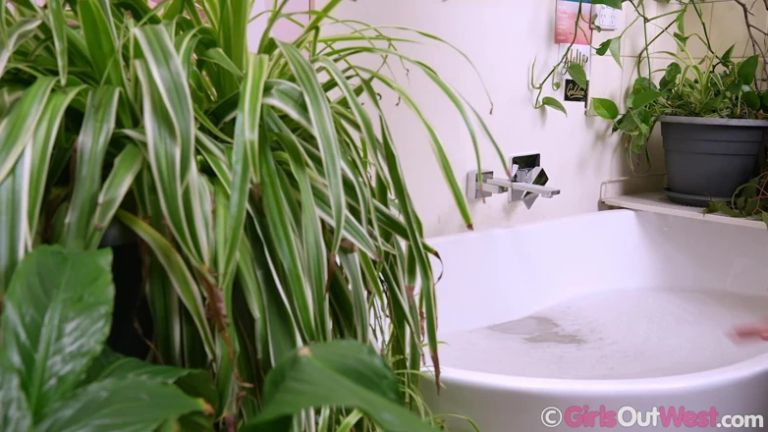 Slim Redhead Takes Bath and Fingers Her Shaved Pussy Oozing Girlcum