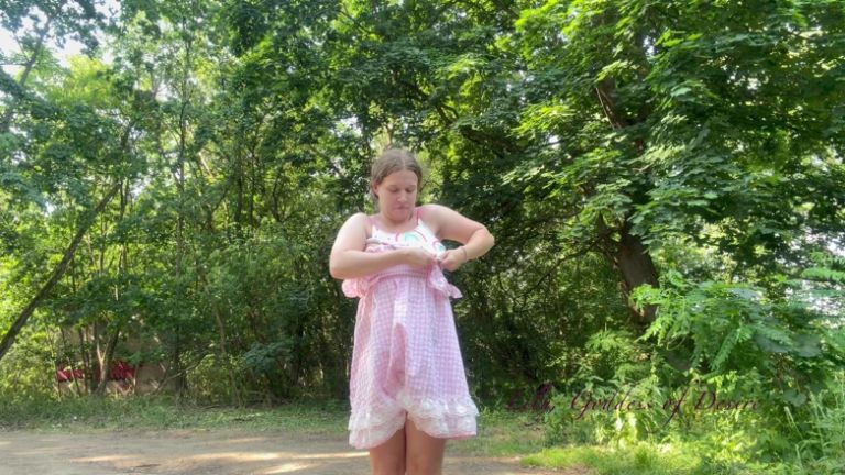 Cute Teen in Costume Playing in the River Like in a Swimming Pool